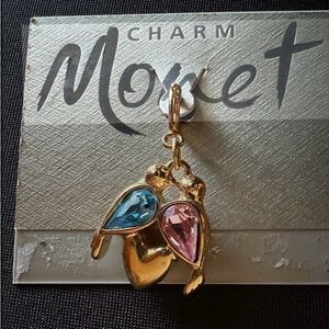 Vintage Monet gold-tone featuring two birds with blue and pink teardrop Charm